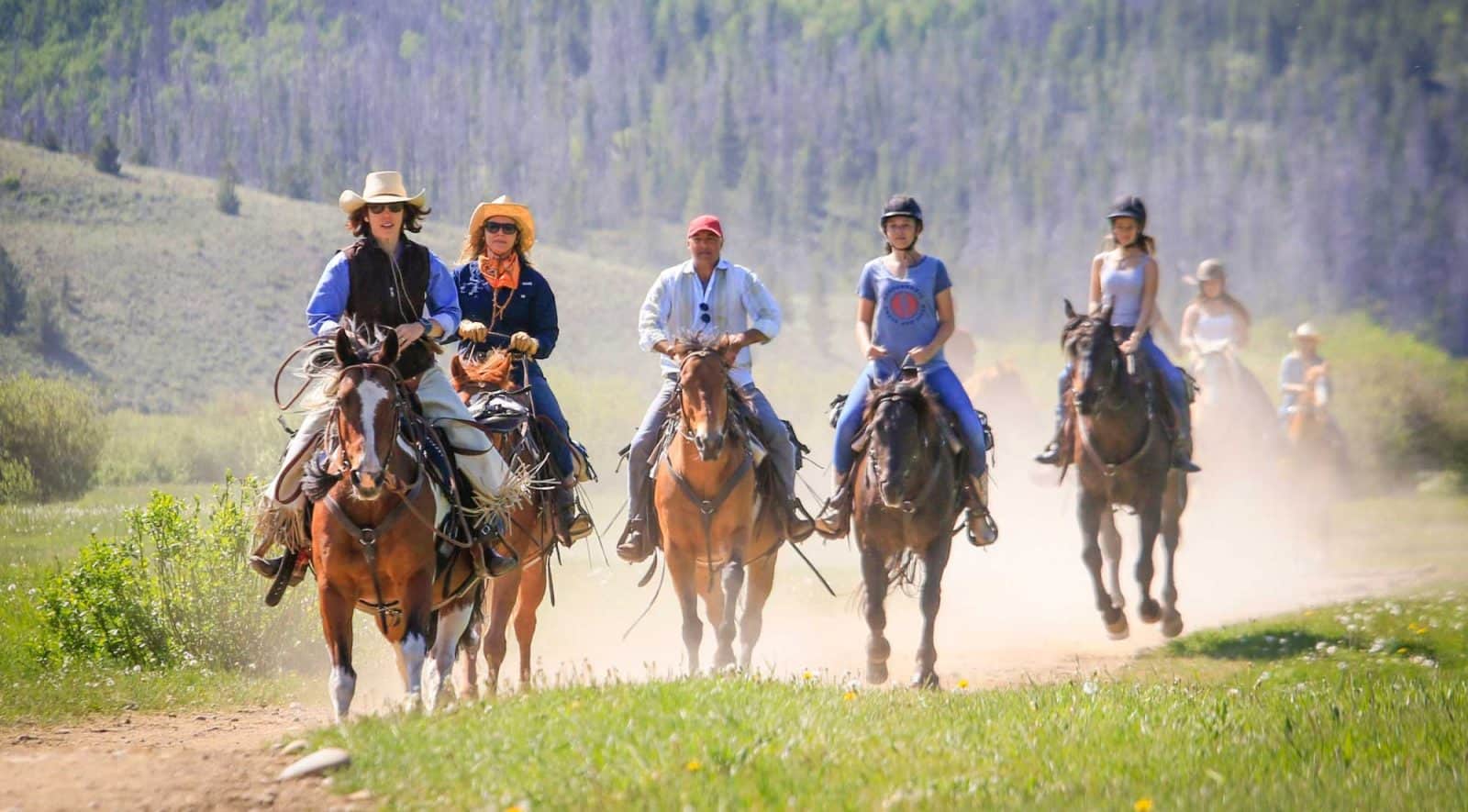 Group of people riding horses