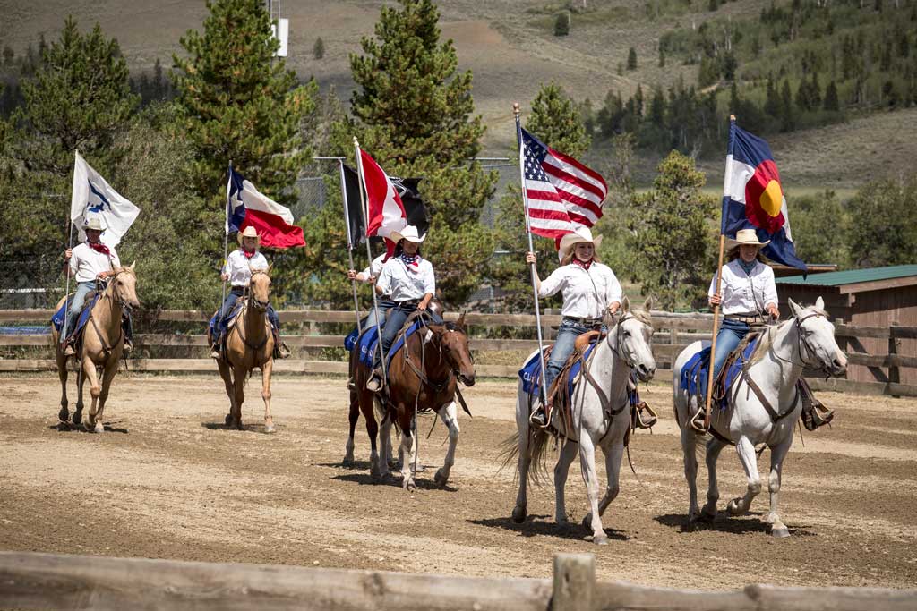 rider holding flags