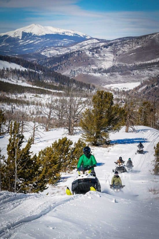 Guests enjoy snowmobiling on miles of groomed trails