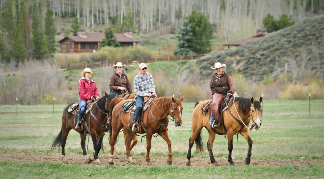 group on top of horses