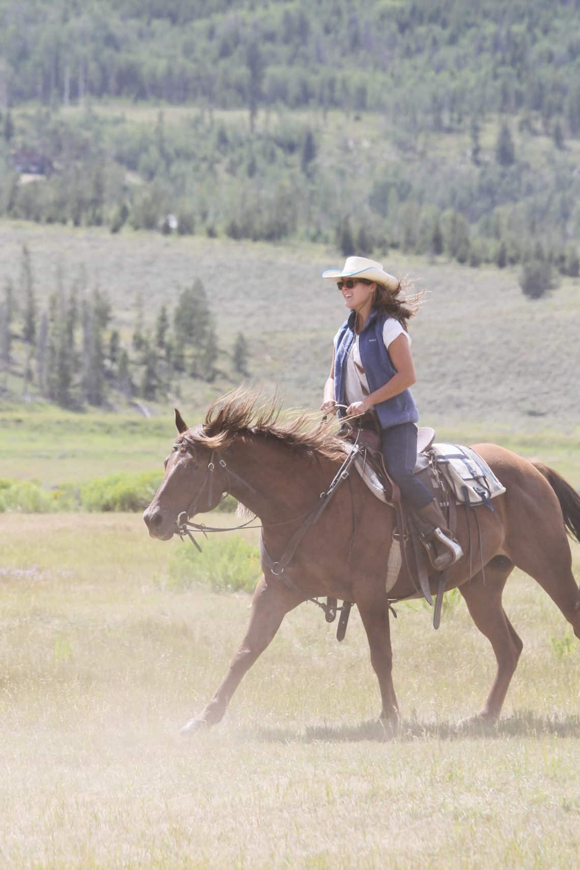 woman on running horse