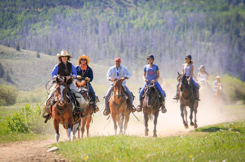 Adults enjoying a nice canter ride