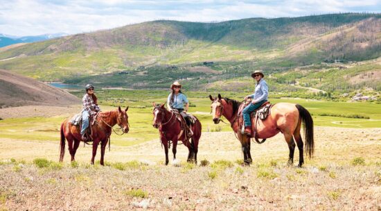 family-on-horses-up-high