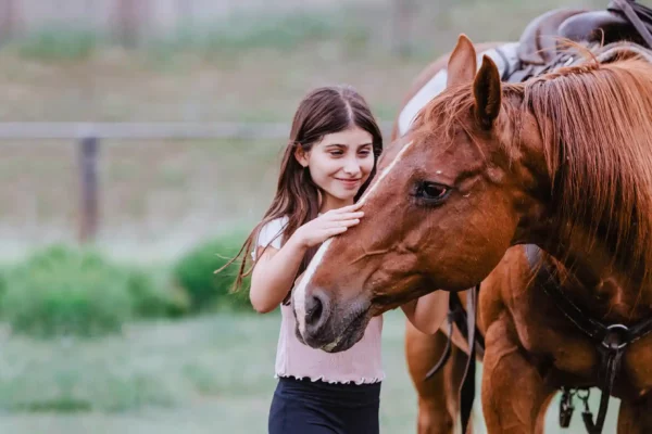 a girl in love with her horse during summer vacation at C Lazy U Ranch