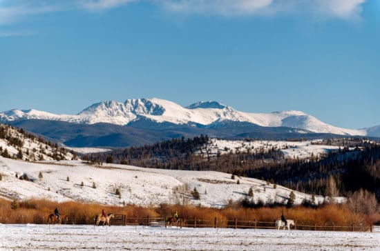 trail-riders-at-foot-of-hill