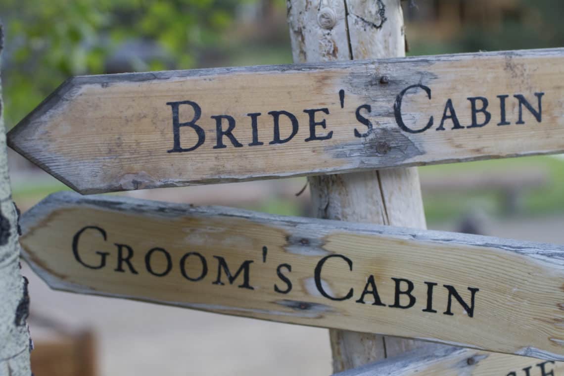 bride and groom cabin signs