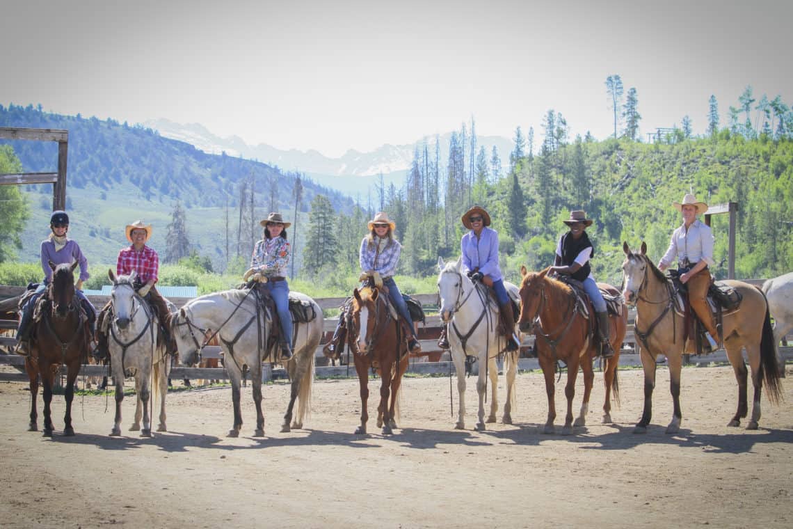 women riding horses