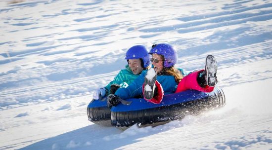 Snow tubers in winter