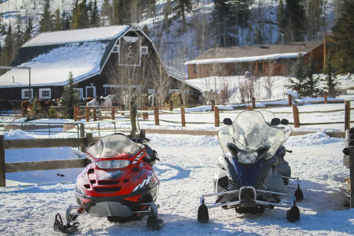 two snowmobiles