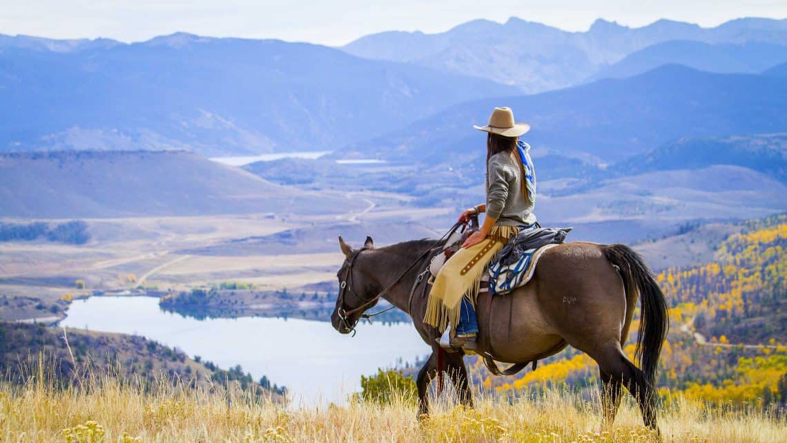 woman-riding-up-high