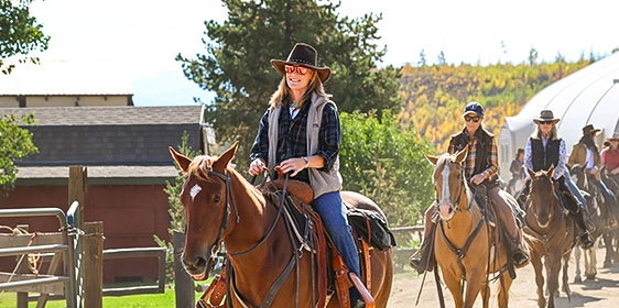 A group of women on horseback at C Lazy U